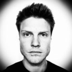 Justin Jackson's black and white headshot