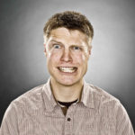 Justin Jackson's professional headshot, taken in Edmonton, Alberta, Canada